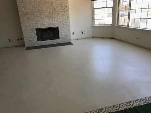 There is a fireplace in the middle of the room.