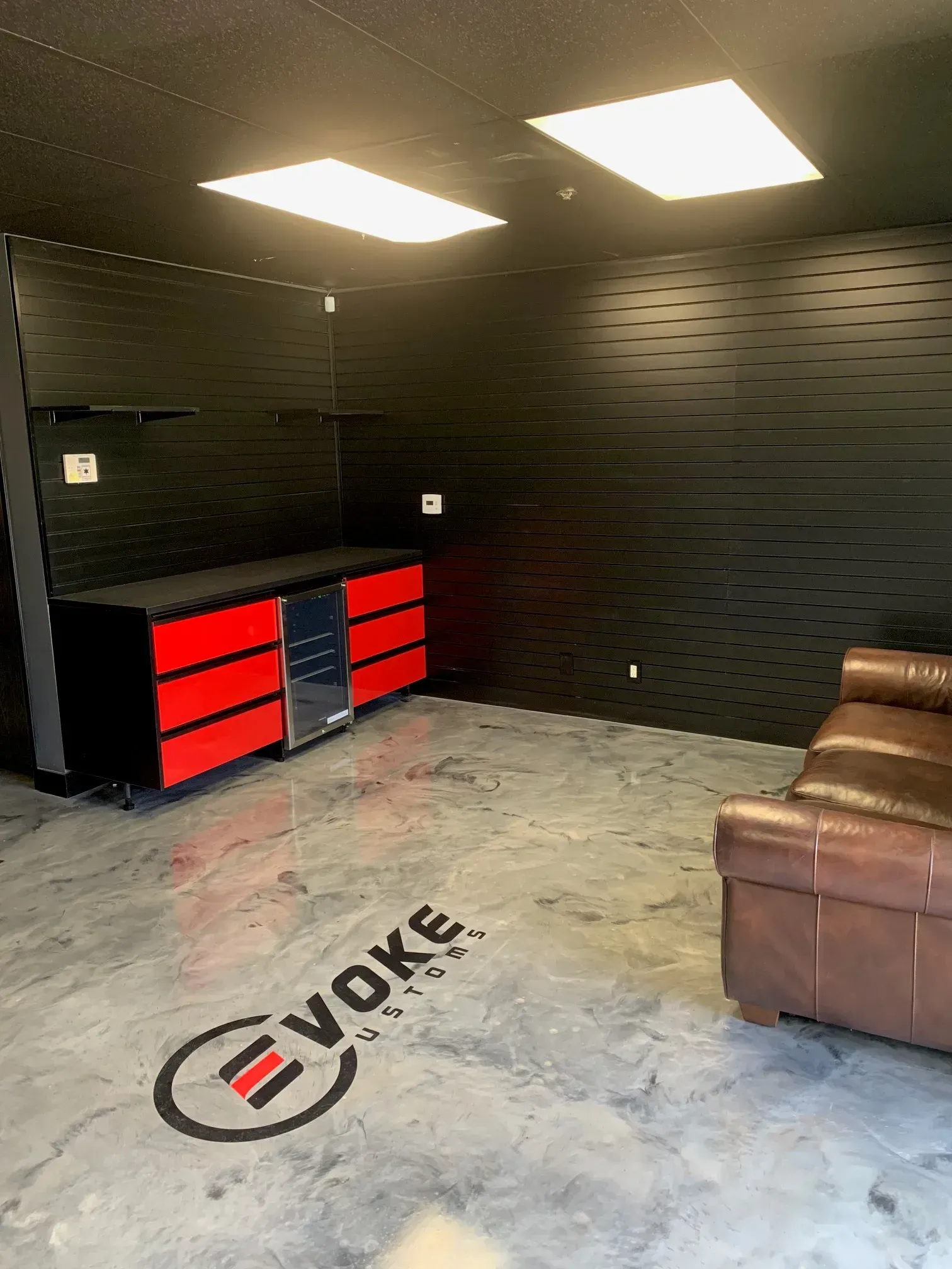 There is a couch in the middle of the room.