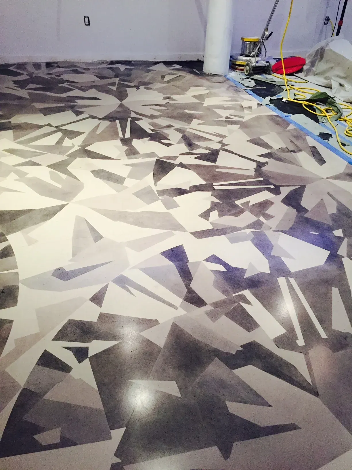 A room with a geometric pattern on the floor