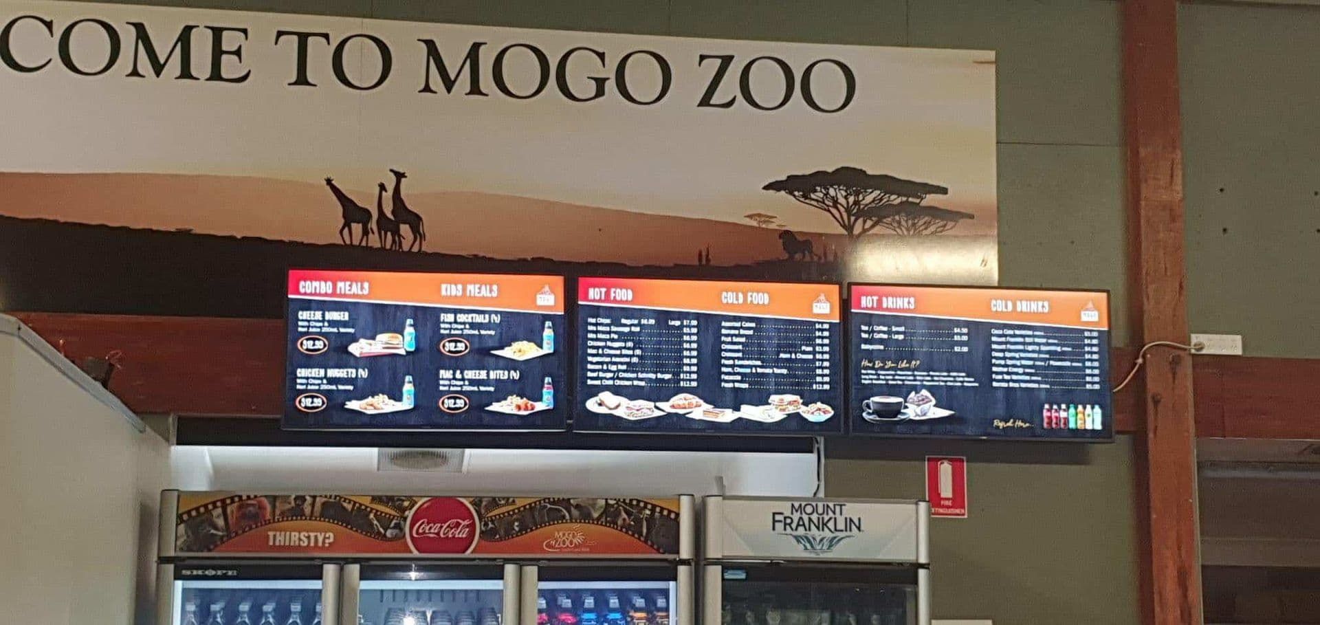 A Restaurant with A Sign that Says Come to Mogo Zoo — Bay Coast Electrical & Control Solutions in Maloneys Beach, NSW