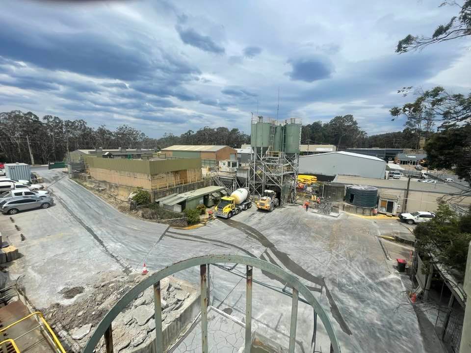 An Aerial View Of A Construction Site With A Lot Of Buildings And Trucks — BayCoast Electrical & Control Solutions in Bawley Point, NSW