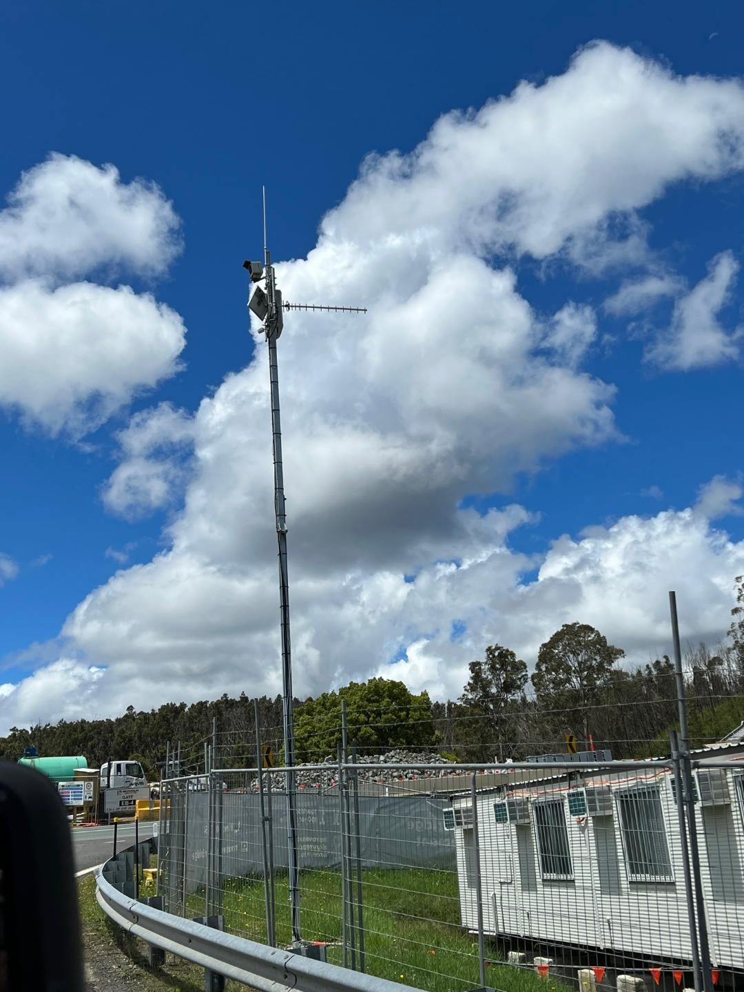 A Blue Sky With White Clouds And A Fence In The Foreground — BayCoast Electrical & Control Solutions in Braidwood, NSW