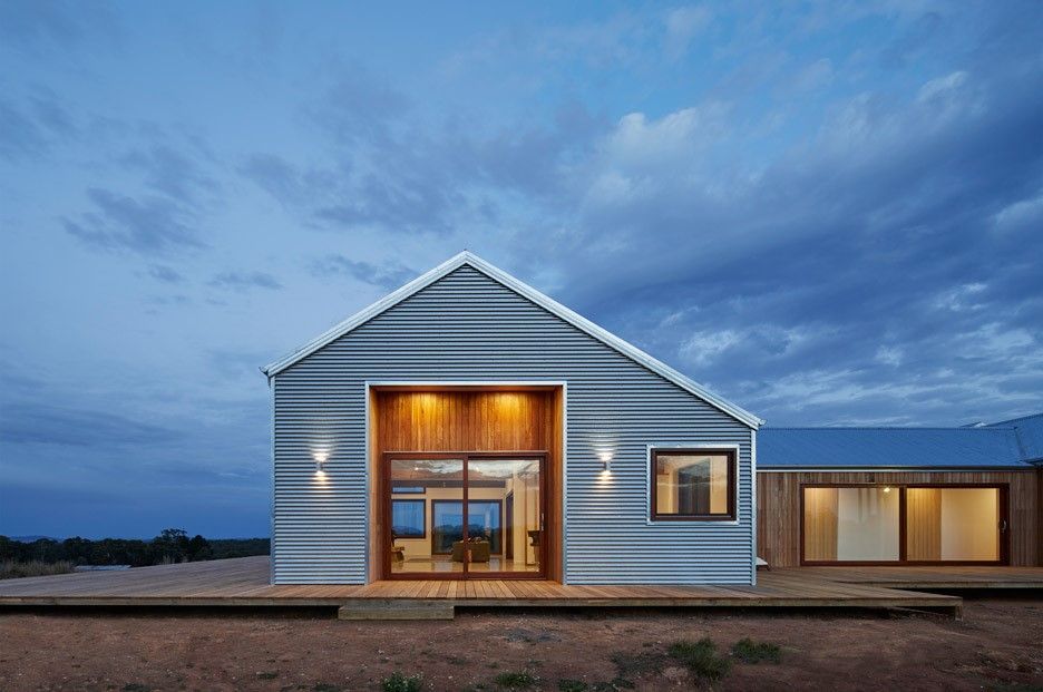 A Large House With A Blue Sky In The Background — BayCoast Electrical & Control Solutions In South Durras, NSW