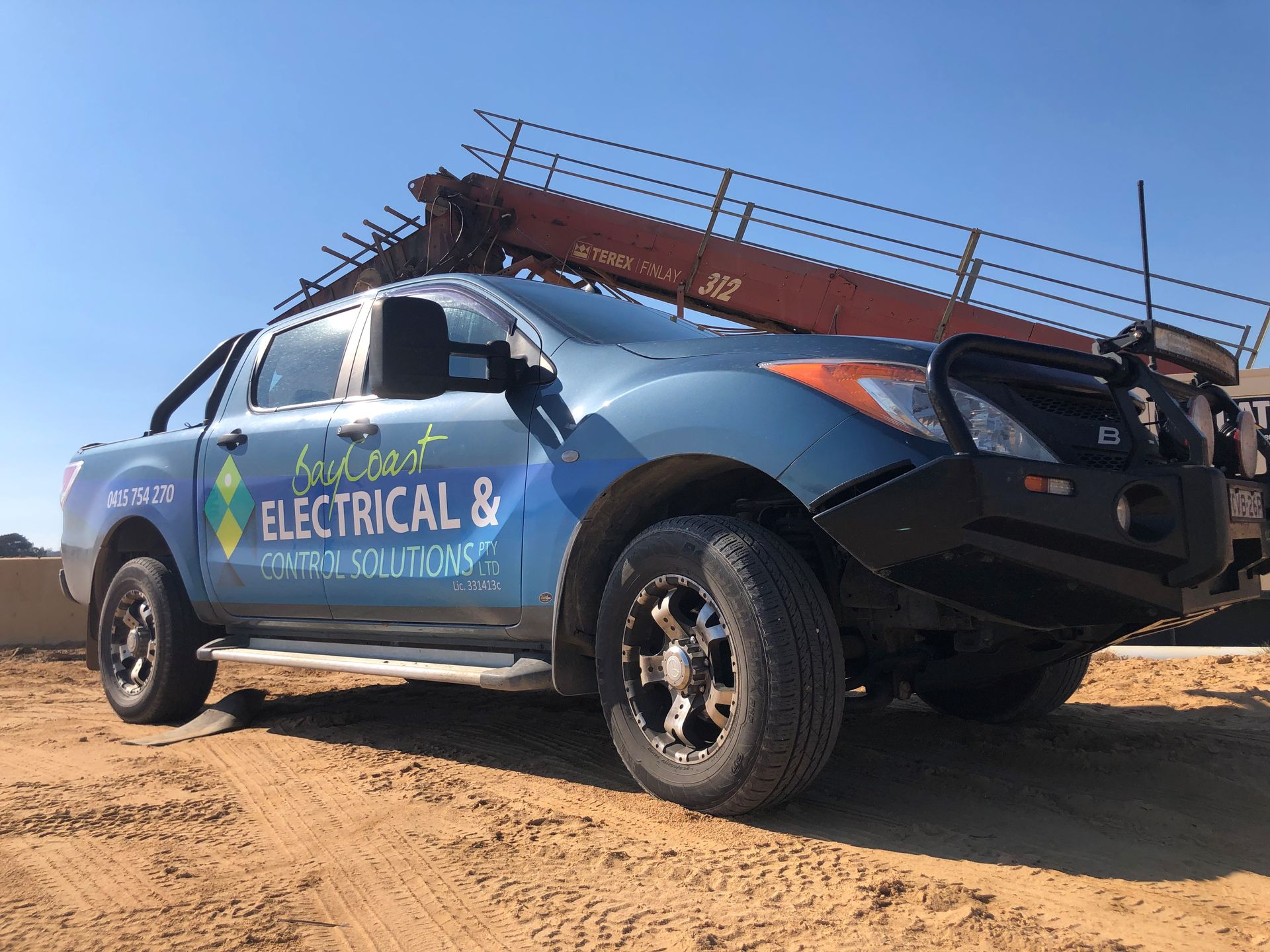 A Diesel Pump Emergency Stop Button Is Attached To A Brick Wall — BayCoast Electrical & Control Solutions in Sussex Inlet, NSW