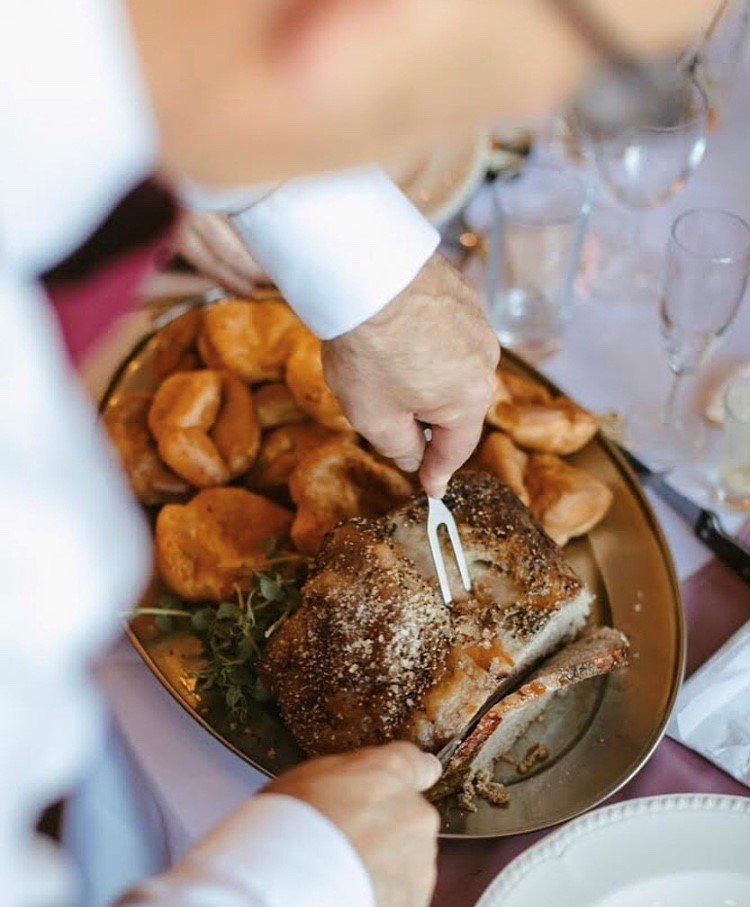 Guests Carving The Beef