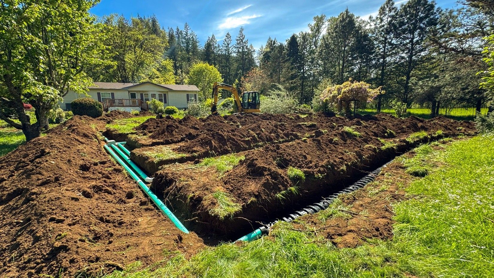 Septic tank system installation process showing water test in newly installed septic tank.