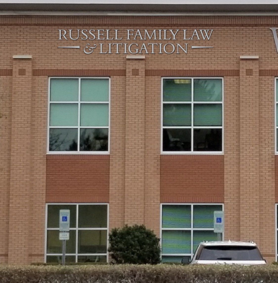 1015 Ashes Drive, suite 104 the front of Russell Family Law Office in Wilmington NC