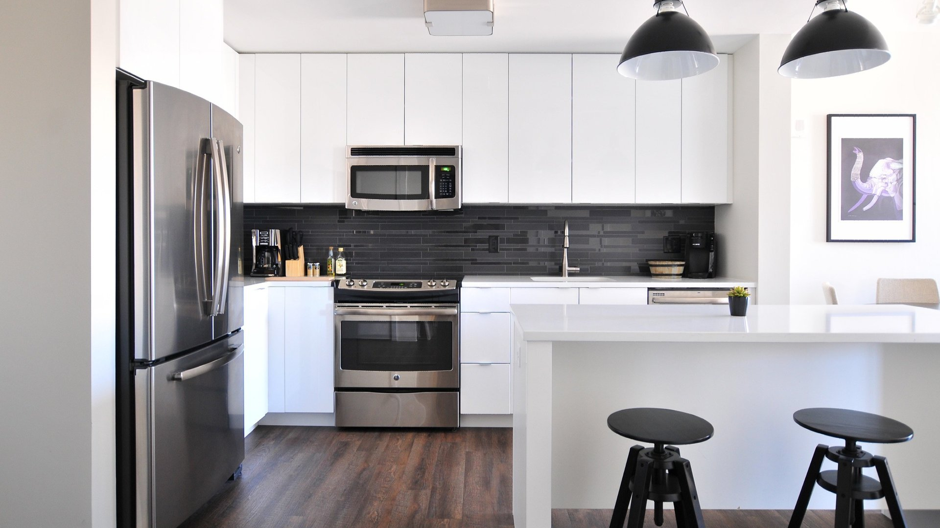 White kitchen with black accents