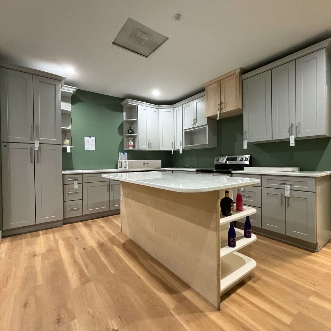 A kitchen with a large island in the middle of it