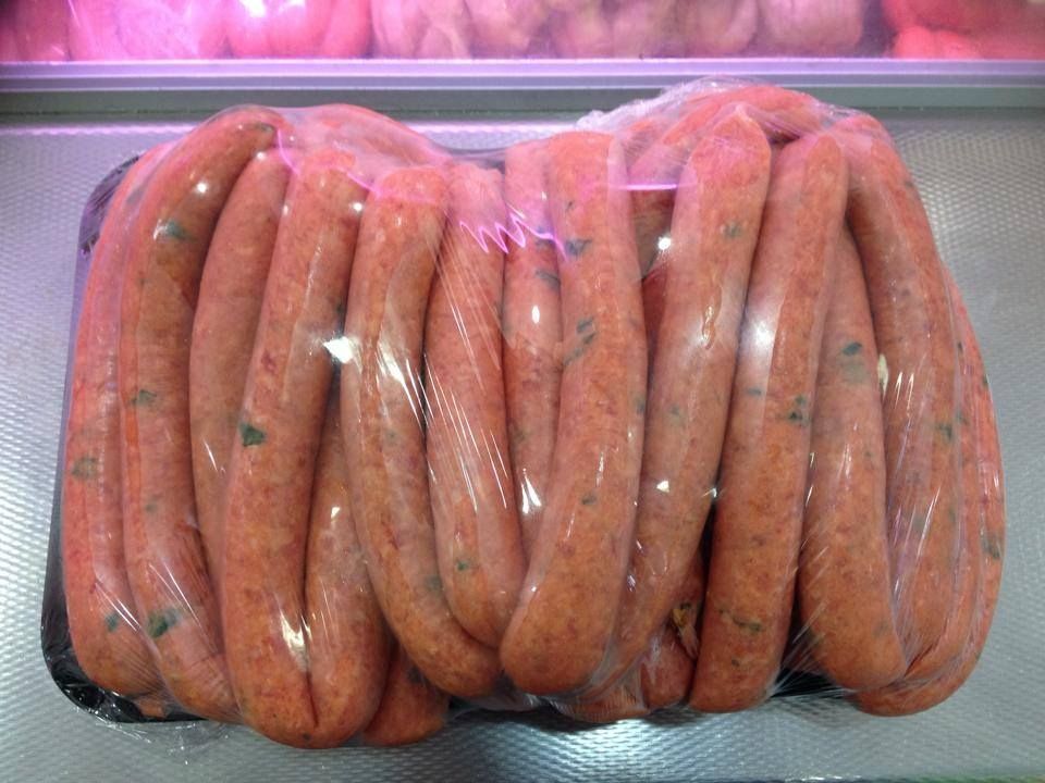 A Bunch Of Sausages Wrapped In Plastic On A Tray — Edgeworth Meat & More in Edgeworth, NSW