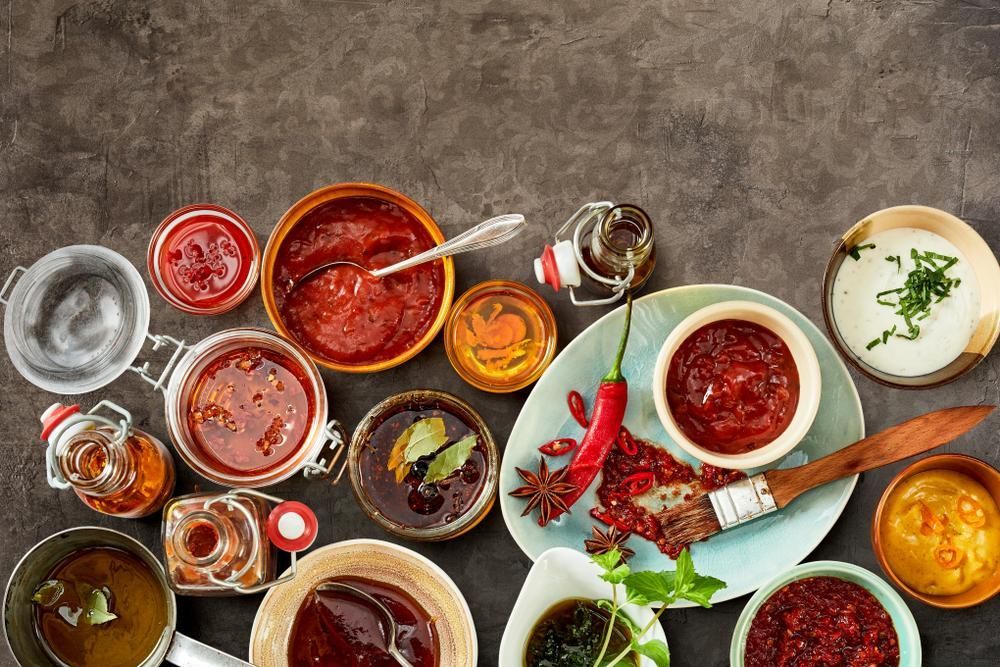 There Are Many Different Types Of Sauces On The Table — Edgeworth Meat & More in Edgeworth, NSW
