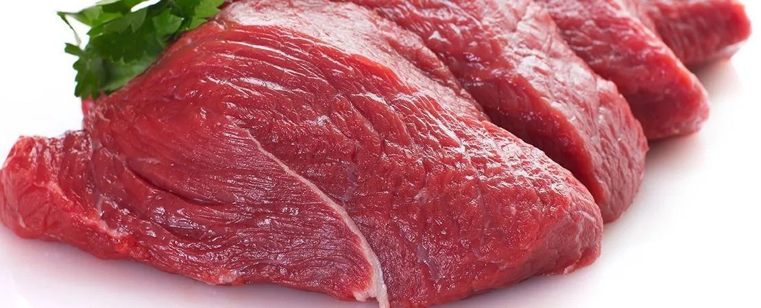 A Close Up Of A Piece Of Raw Beef On A White Surface — Edgeworth Meat & More in Edgeworth, NSW