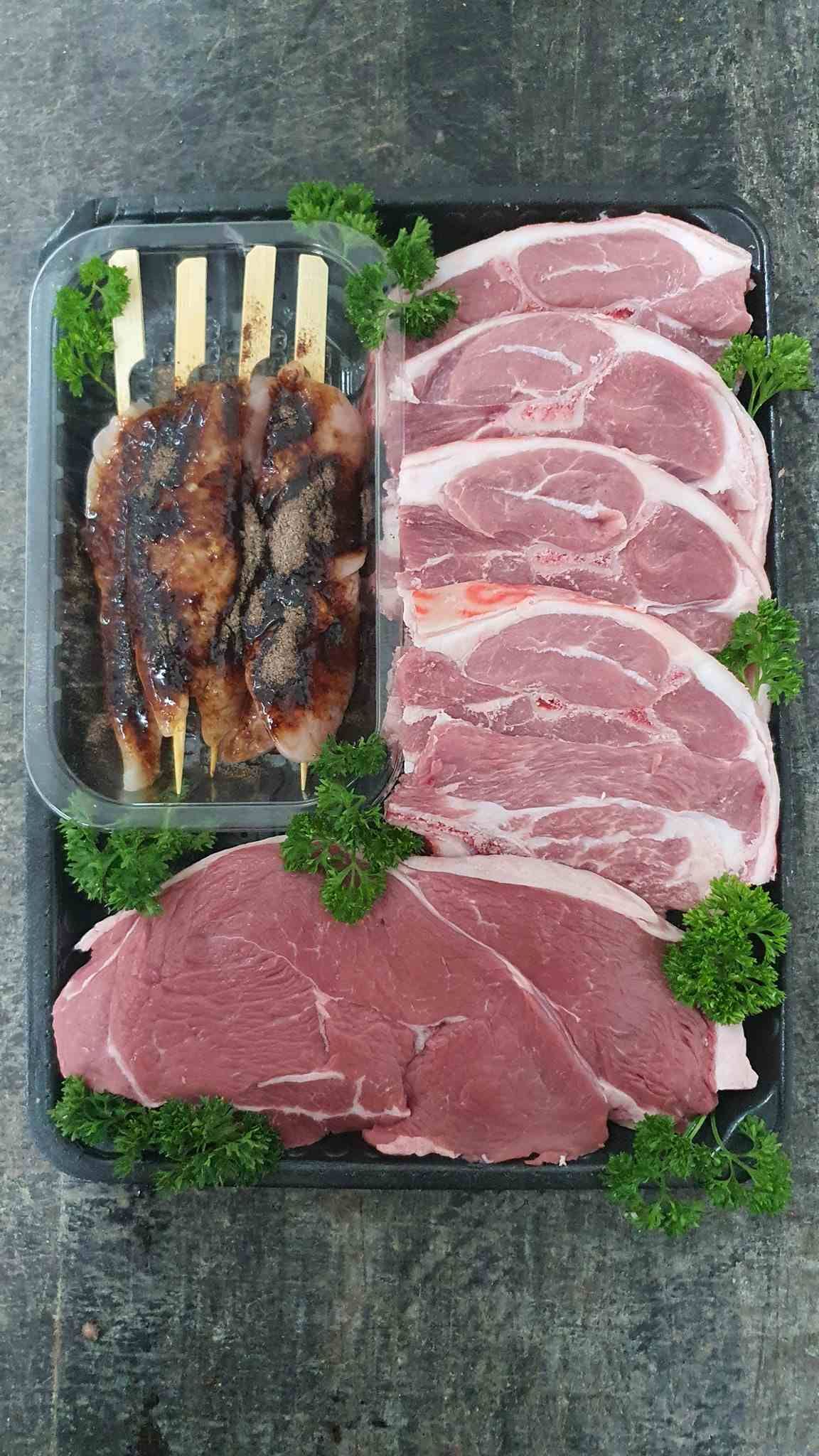 A Tray Of Meat And Skewers On A Table — Edgeworth Meat & More in Edgeworth, NSW