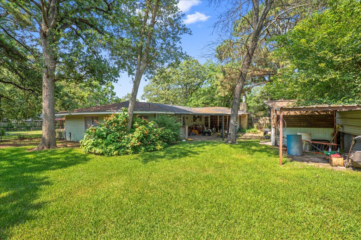 House with Trees — Rockdale, TX — Carol Matous - Jim Currey Realty