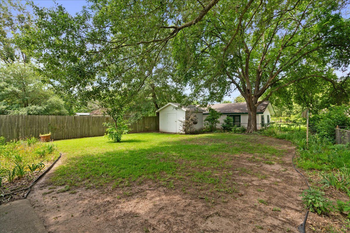 Back of House with Garden Area — Rockdale, TX — Carol Matous - Jim Currey Realty