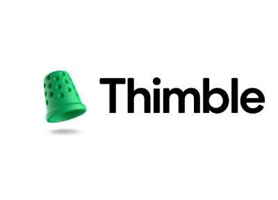 A green thimble is floating in the air next to the word thimble.