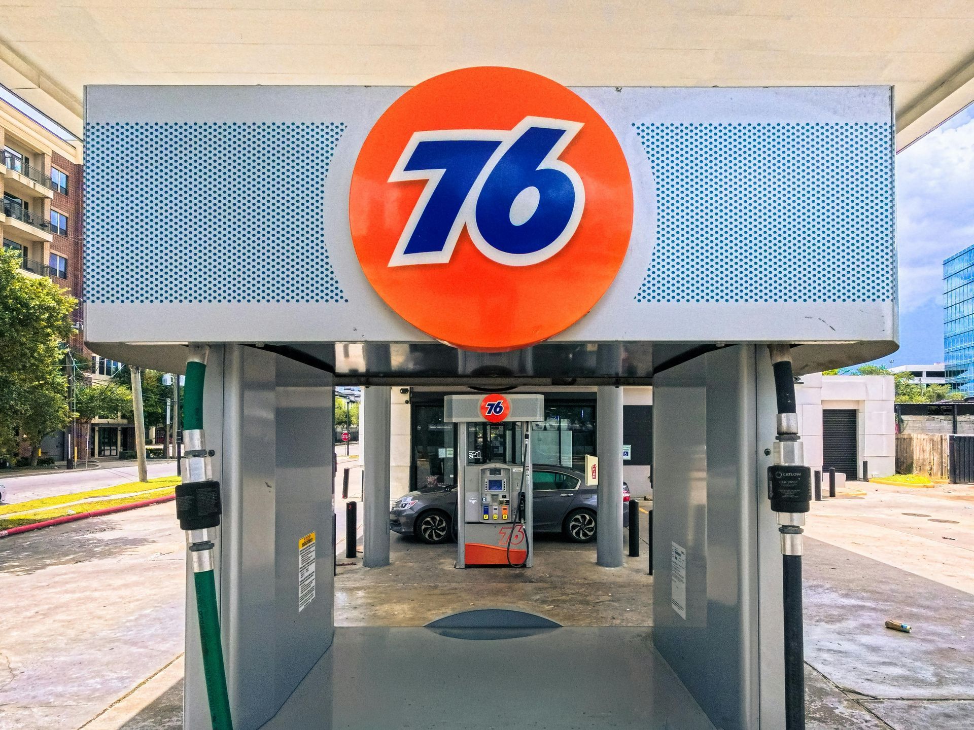 Texas car with hail dents being inspected by insurance adjuster