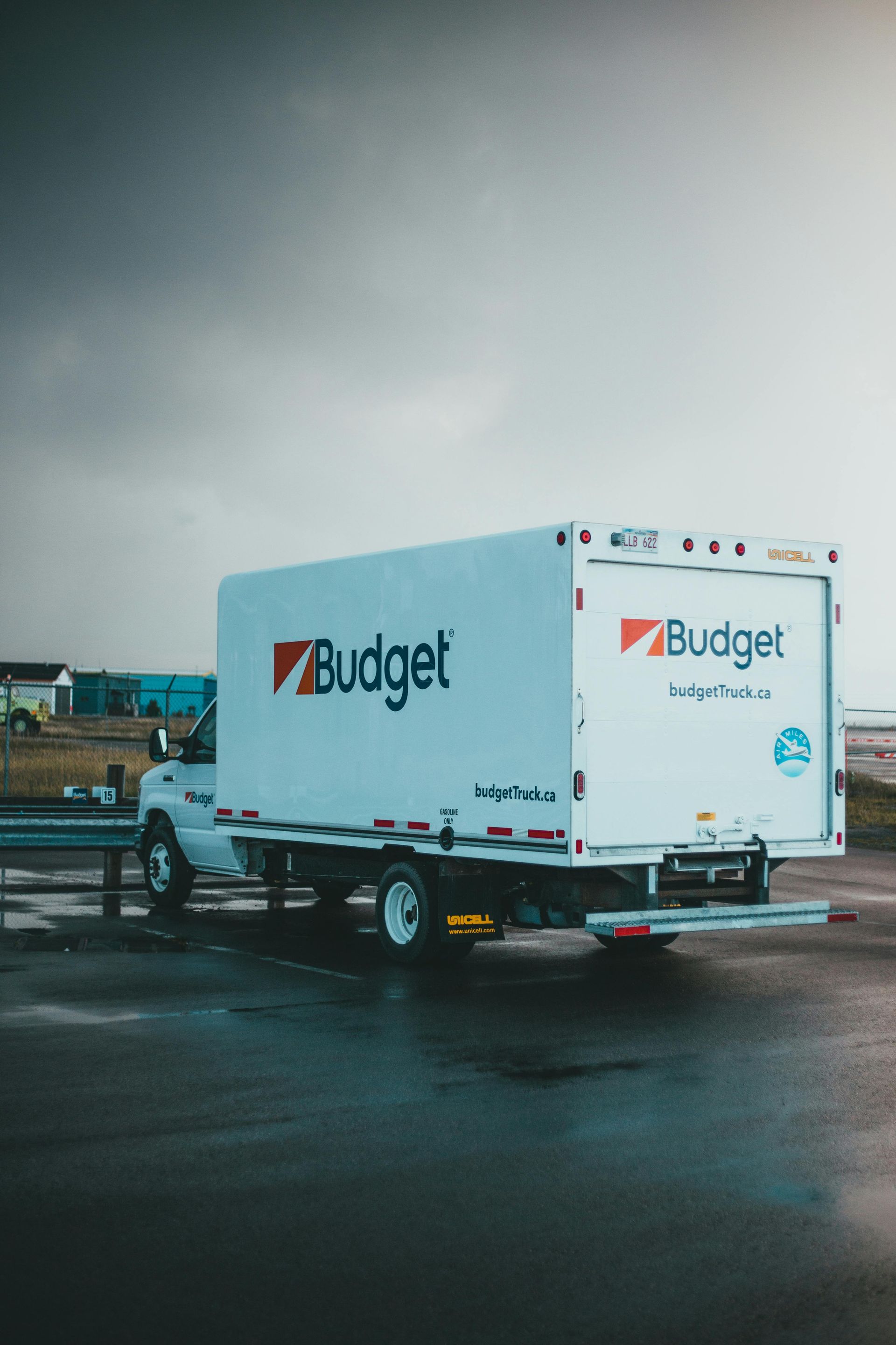 Texas box truck owner reviewing commercial trucking insurance options for delivery and expedited fre