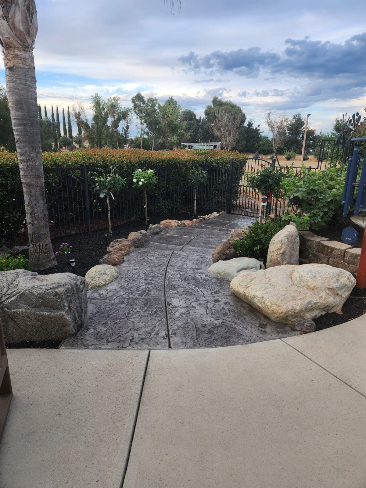 Complete front yard landscaping at a residential entrance in Stockton.