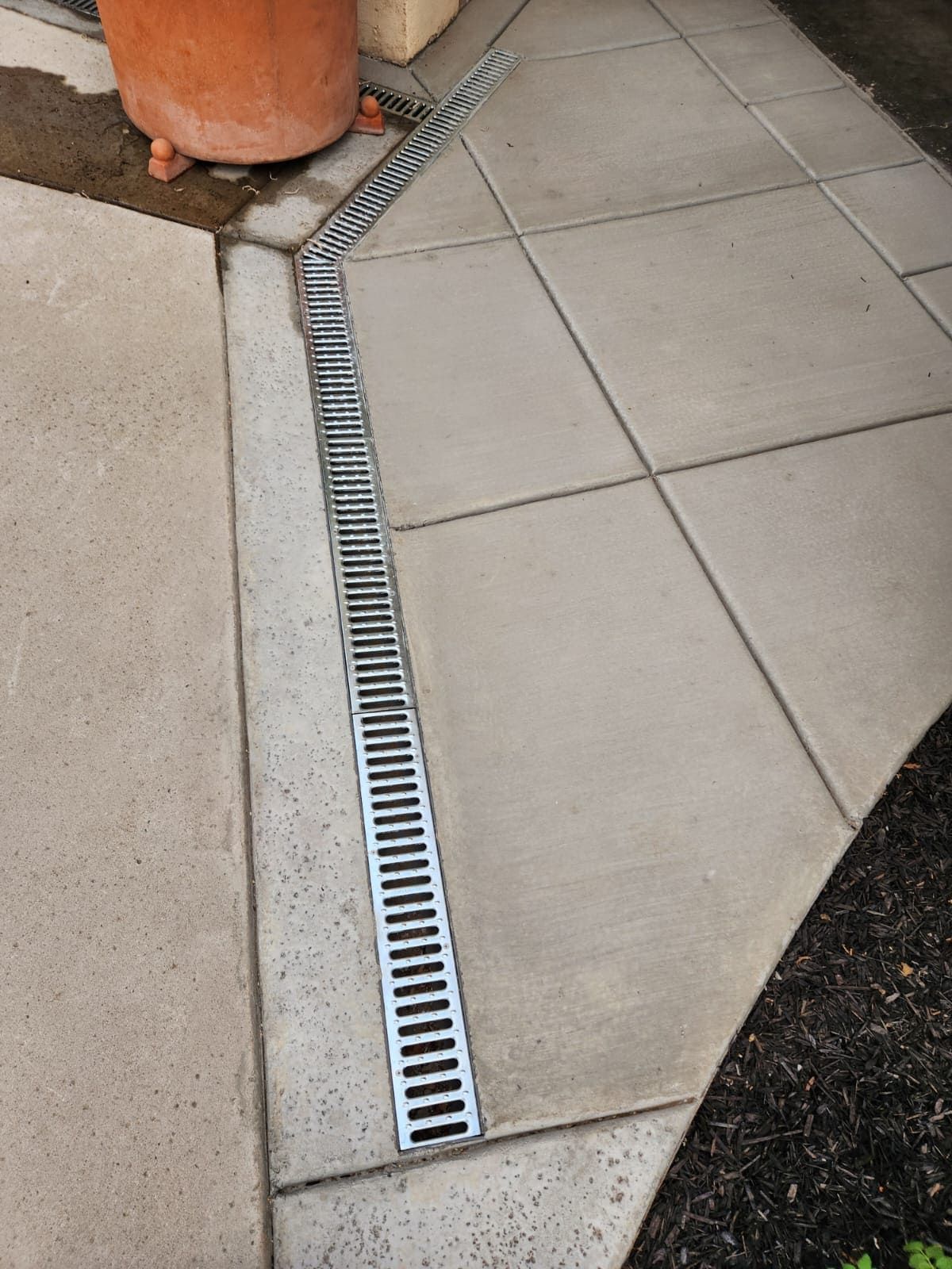Drainage-focused concrete construction with griddle system in Stockton.