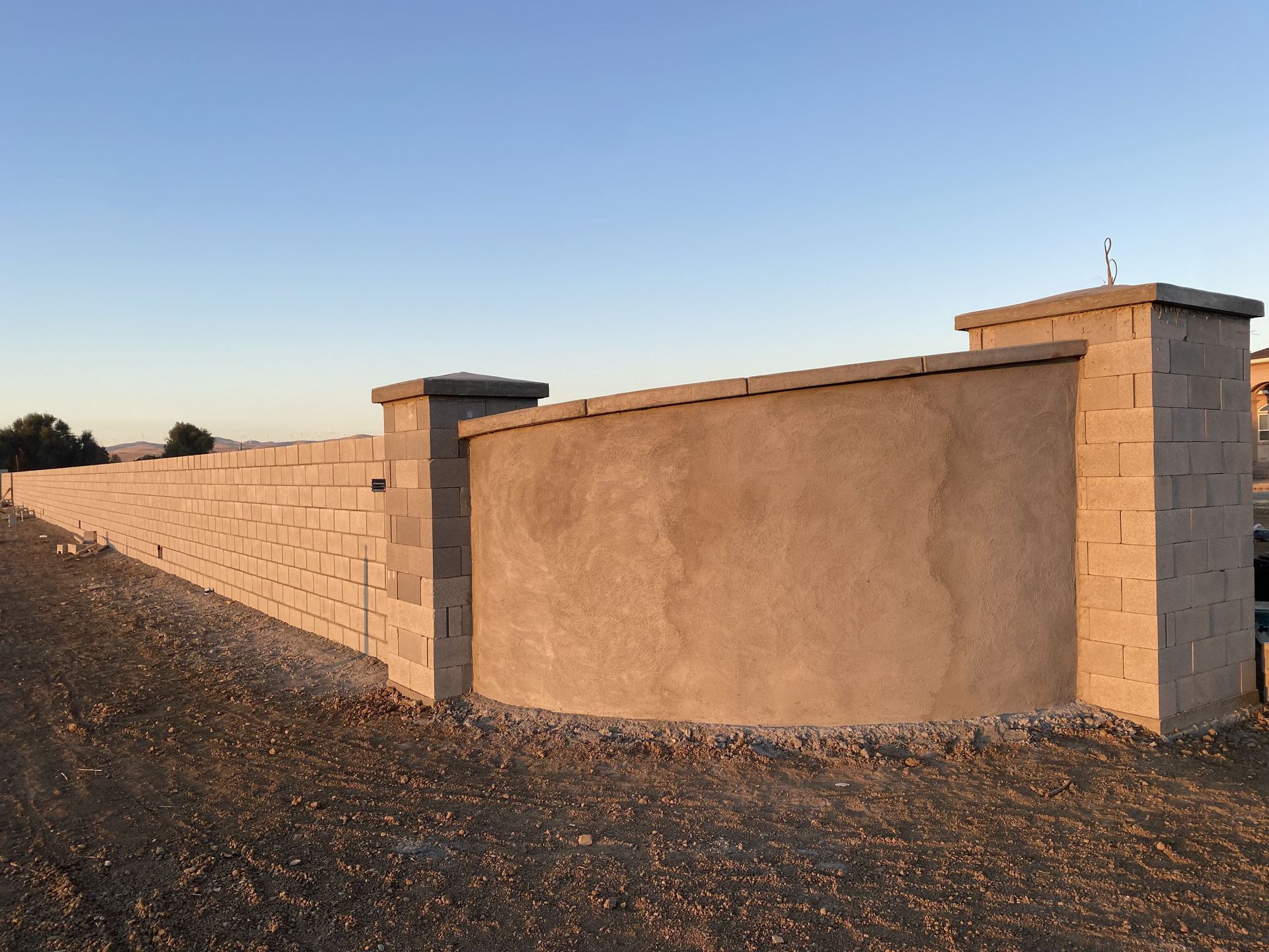 Residential retaining wall installation protecting a Stockton home from soil erosion and water runof