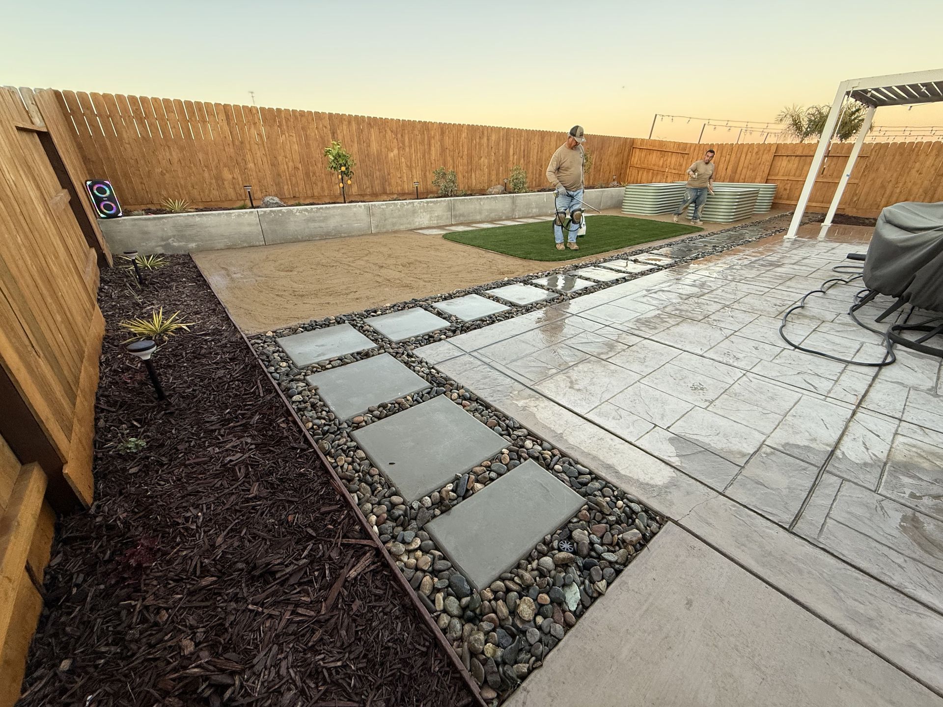 Custom outdoor living space built on a Stockton patio with pavers and seating area by Drago Inc.