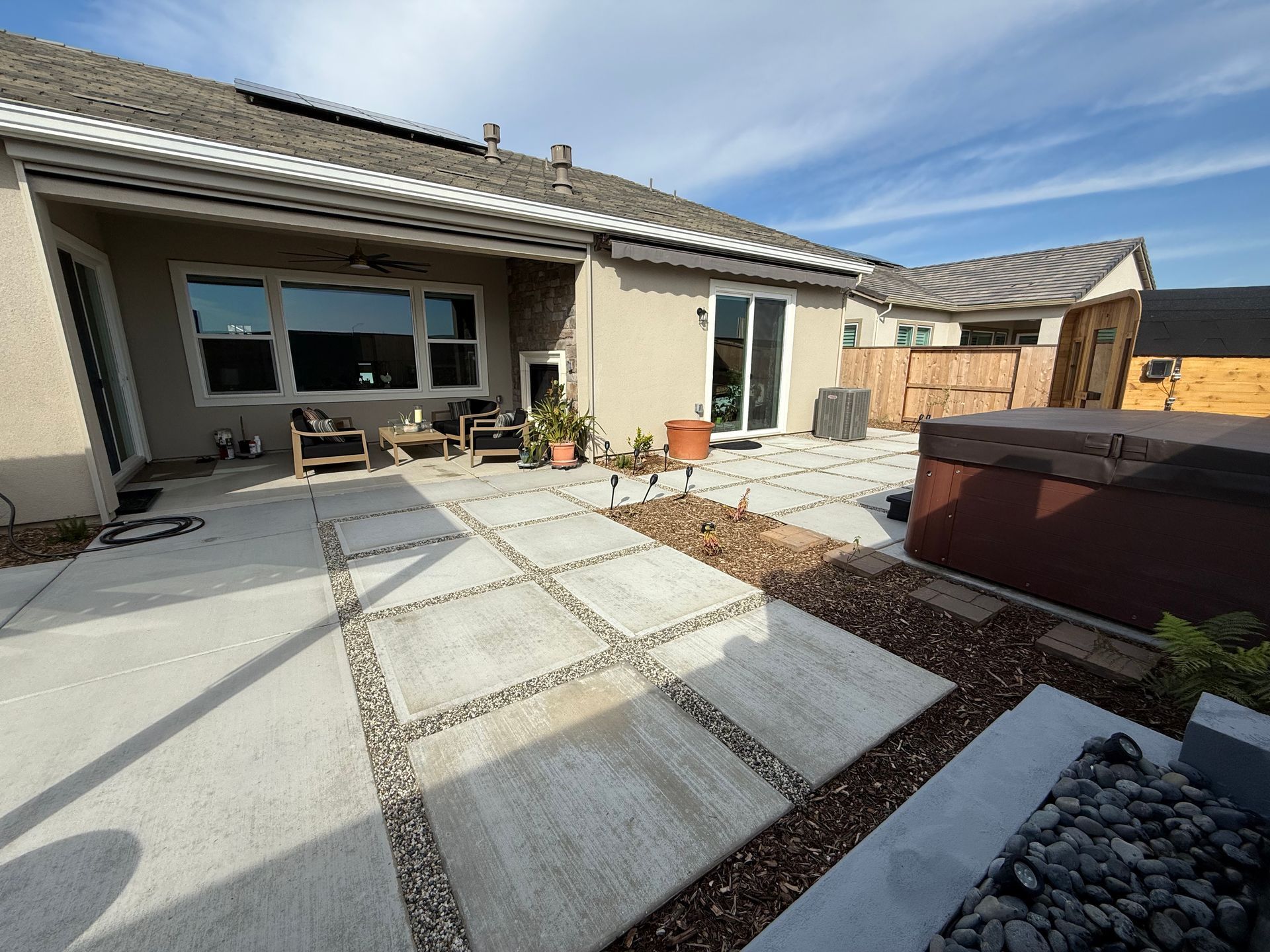 Freshly poured backyard concrete patio in Central Valley home