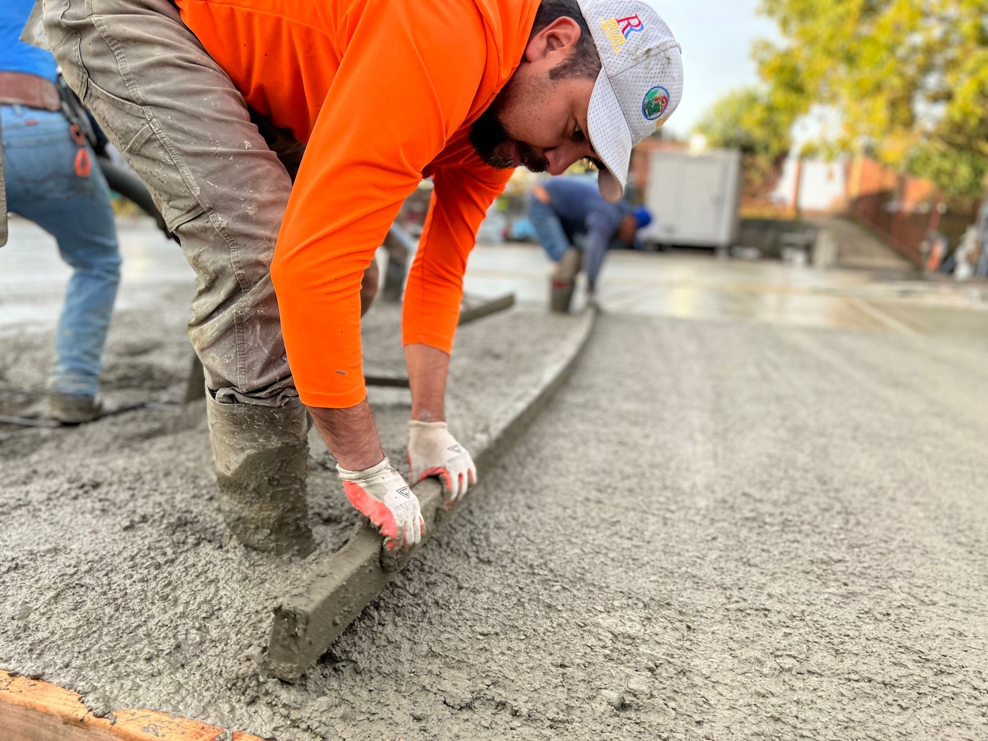 Professional concrete contractor working on Stockton CA driveway project