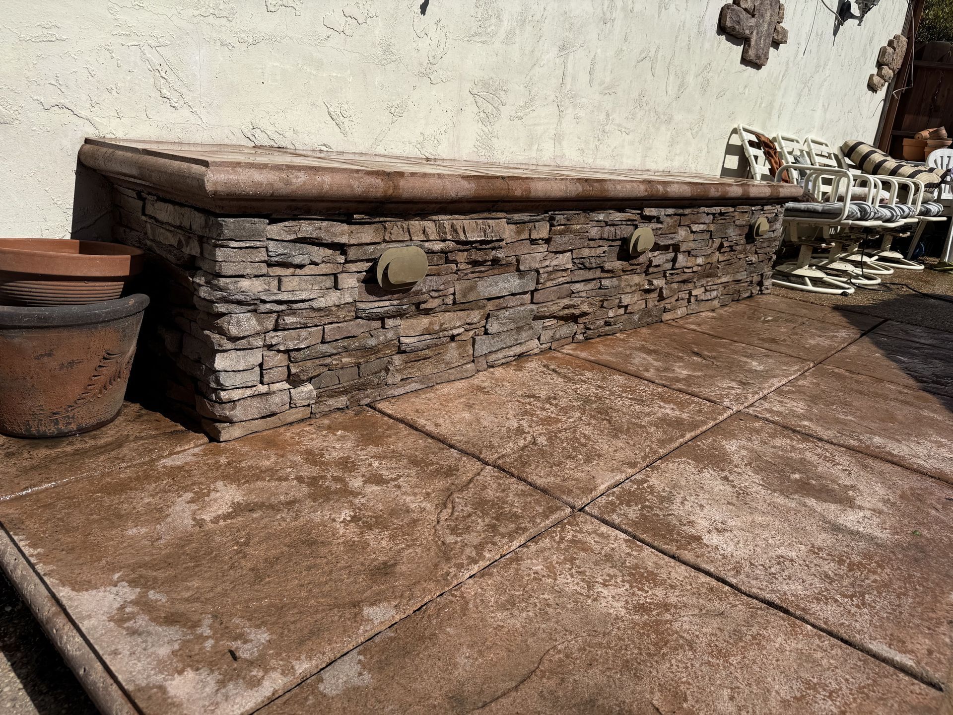 Outdoor resting area built with concrete and pavers in Stockton CA.