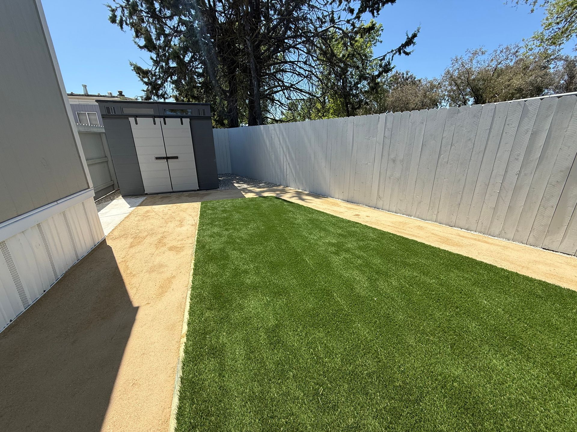 Fresh turf installed as part of Stockton landscaping project.