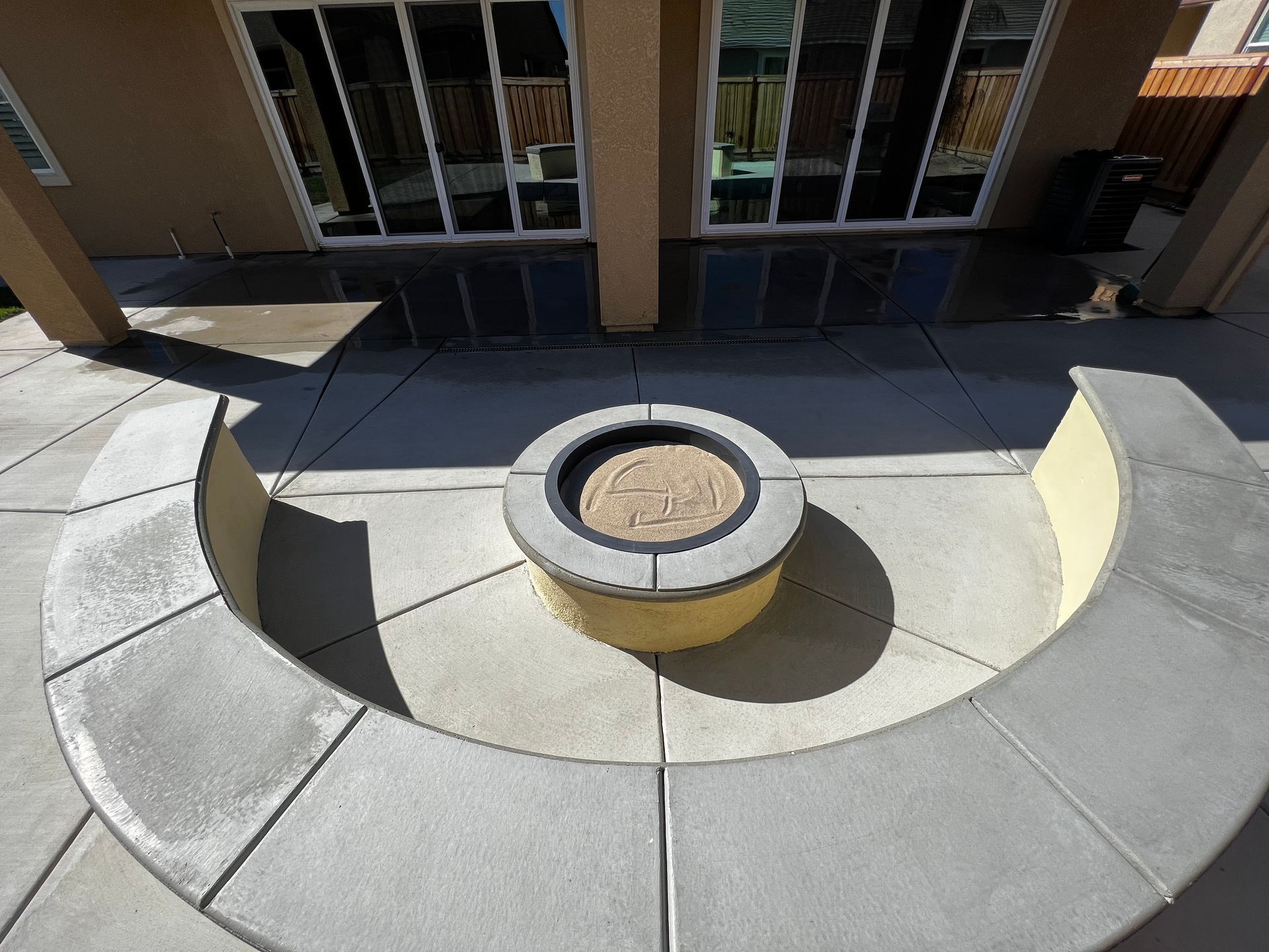 Outdoor firepit and sitting area on concrete patio in Stockton.