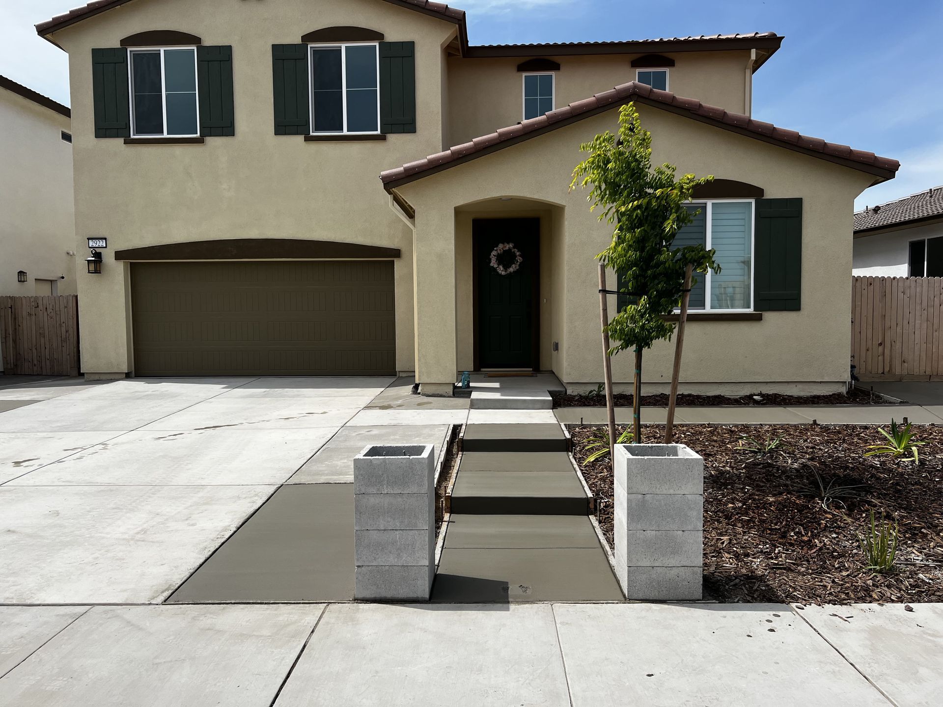 Concrete path installed in front of Stockton home.