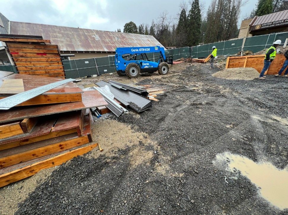 Existing surface of commercial space prior to concrete driveway installation.