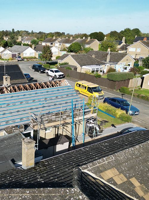 roof of a house in a residential area .