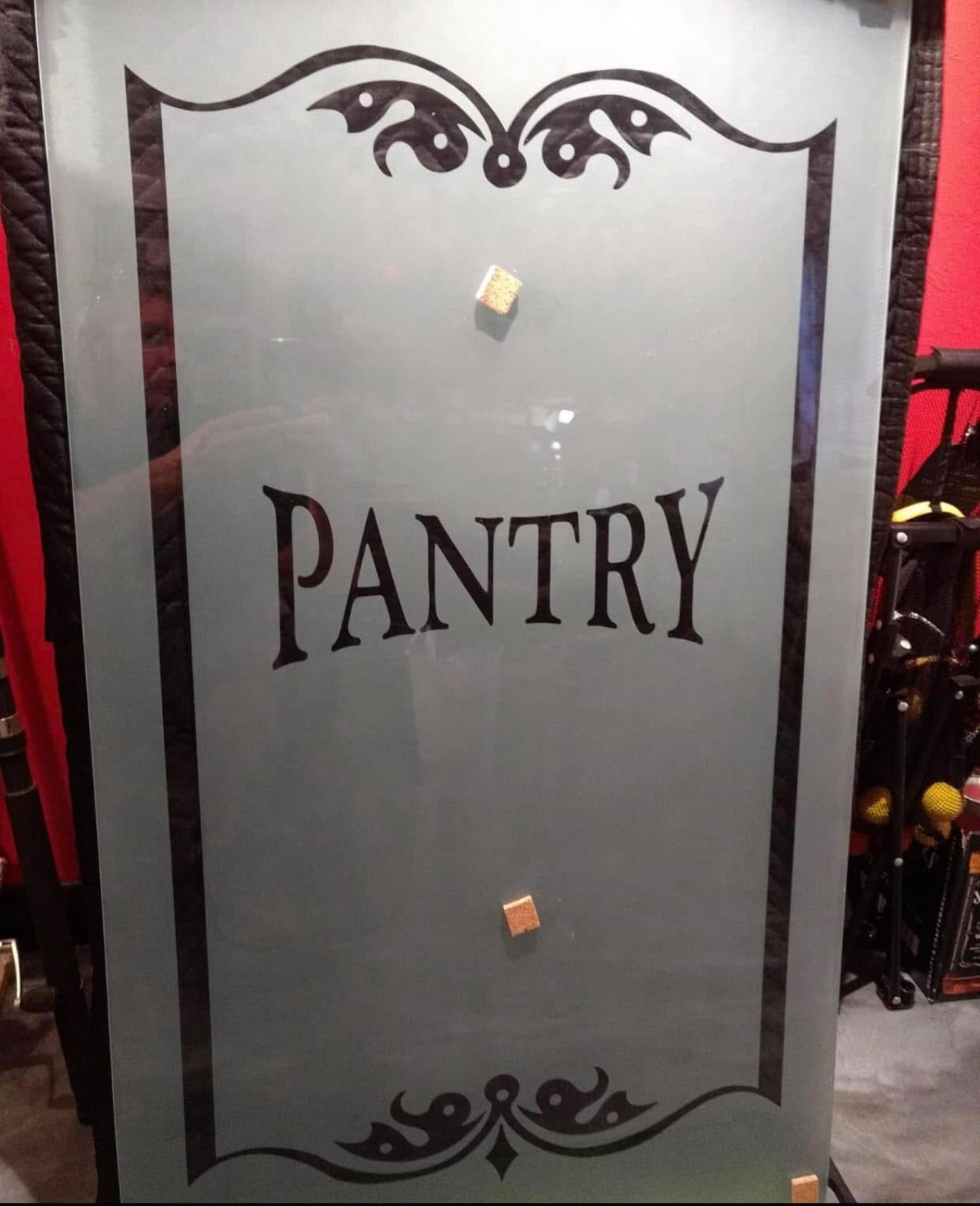 Frosted glass pantry door with black border,