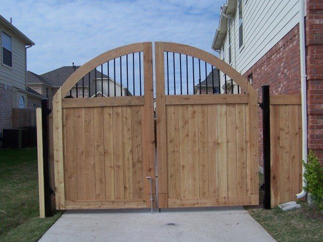 Wooden gate with bars on top - Custom gate fabrications in Plano, TX