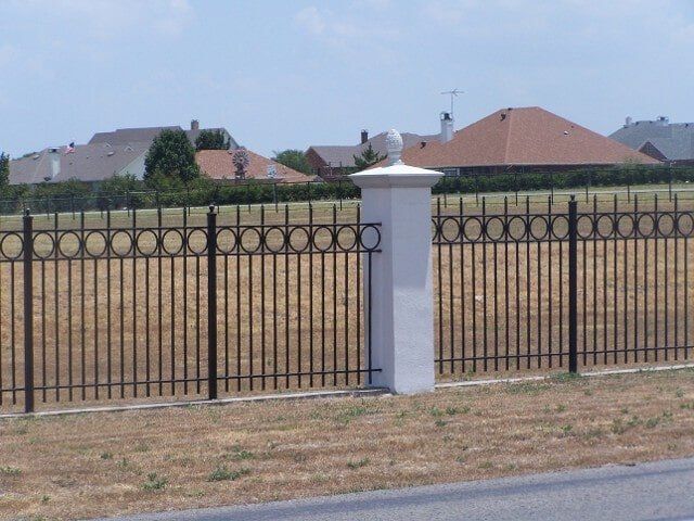 Steel gate surrounding residential property - Custom gate fabrications in Plano, TX
