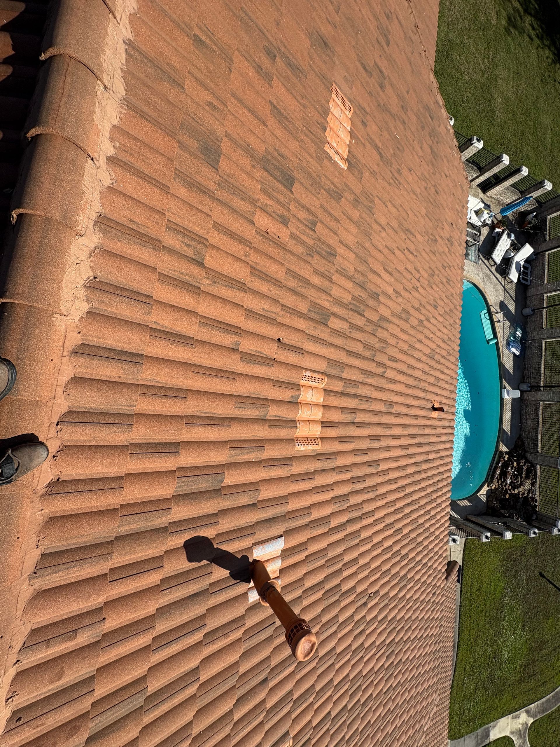 Power washing a house