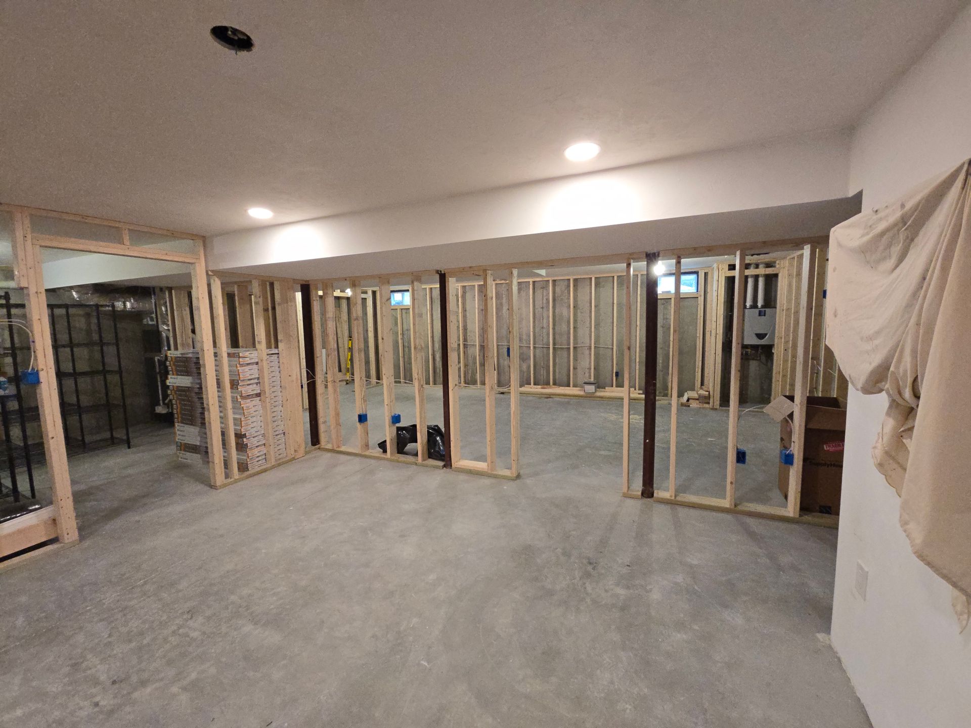 Basement Remodeling Project in Melrose, MA, by New England Painting and Contracting