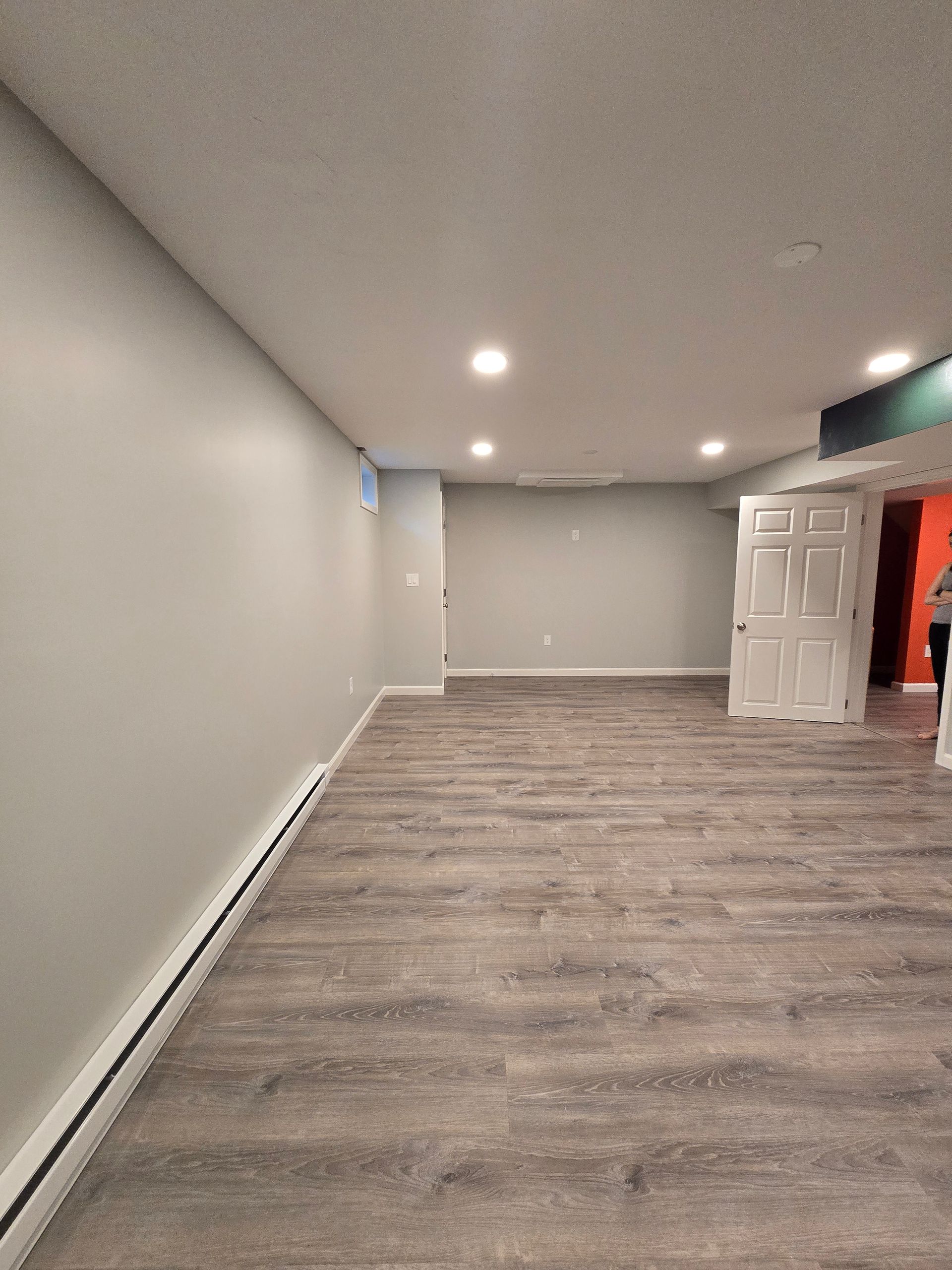 Basement Remodeling Project in Melrose, MA, by New England Painting and Contracting