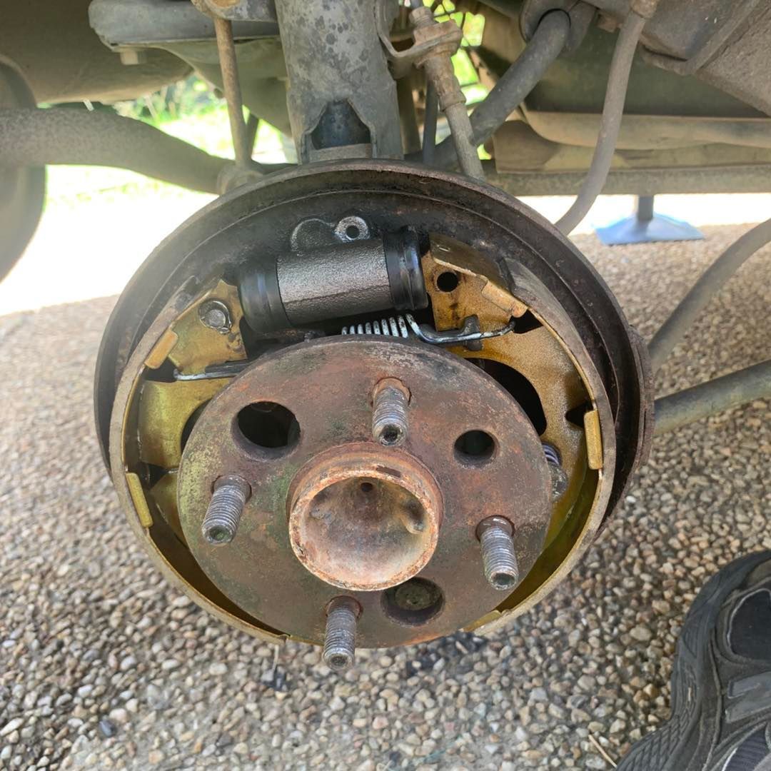 Rear Car Drum Brake Assembly, Partially Disassembled, Showing Brake Shoes, Cylinder, and Hub — Calvin's Mobile Mechanics In Elanora, QLD