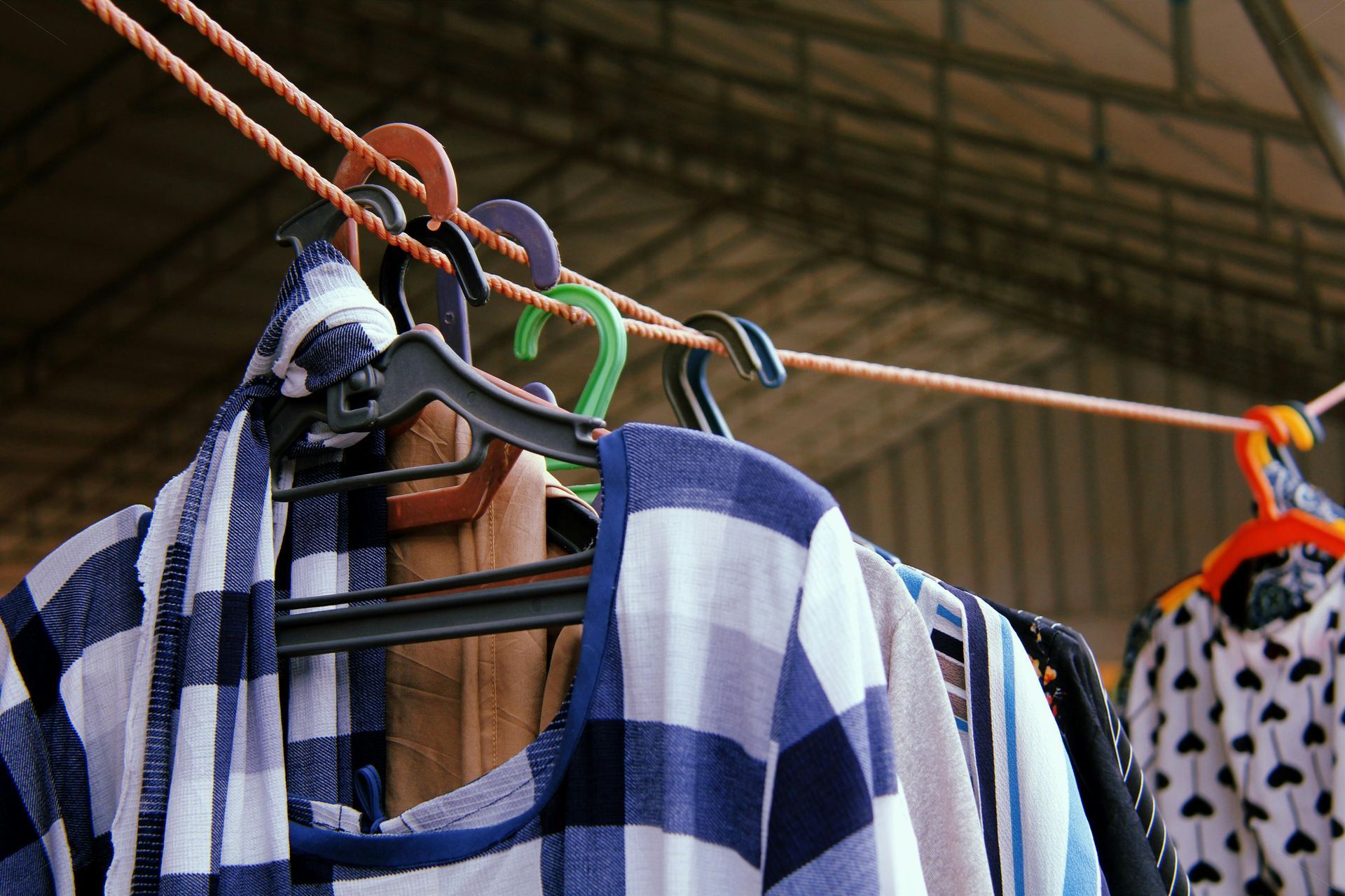 A bunch of clothes are hanging on after laundry