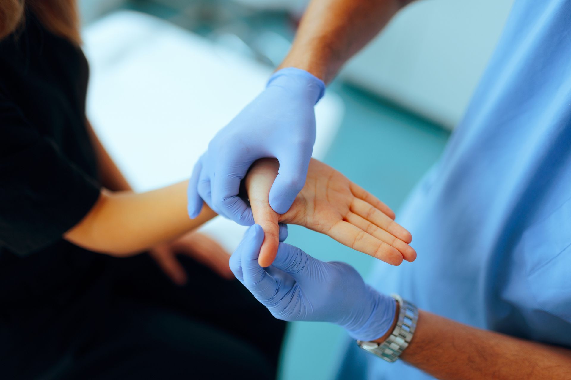 A woman with inflammatory disease getting help with hand pain and numbness treatment. A woman with inflammatory disease getting help with hand pain and numbness treatment.