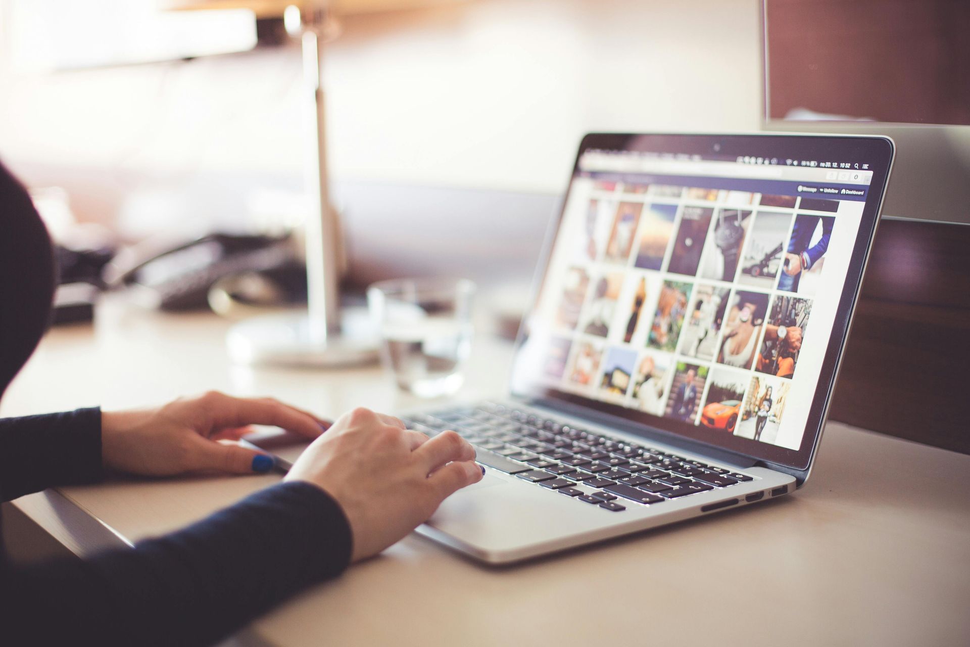 A person using a laptop.