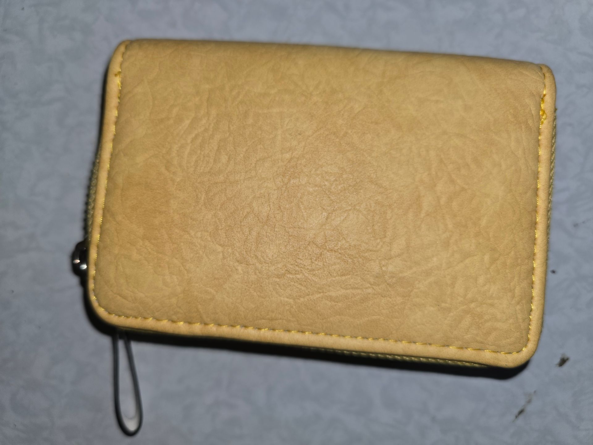 portomonee klein ster geel