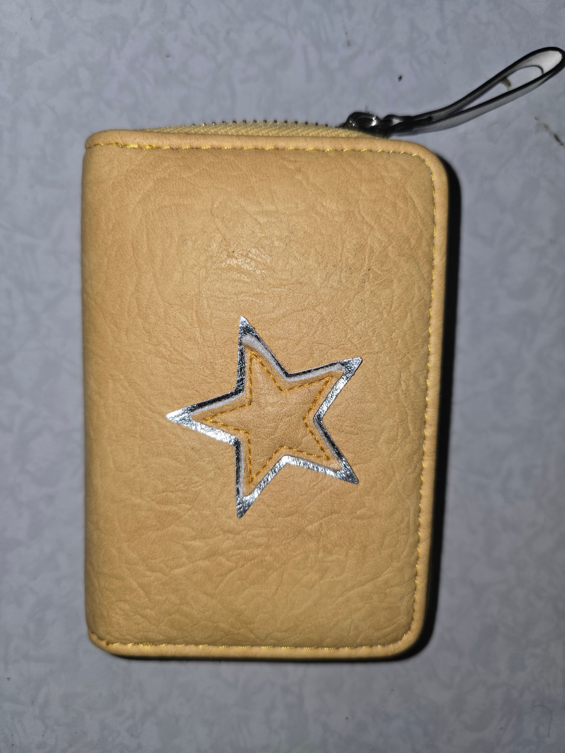 portomonee klein ster geel