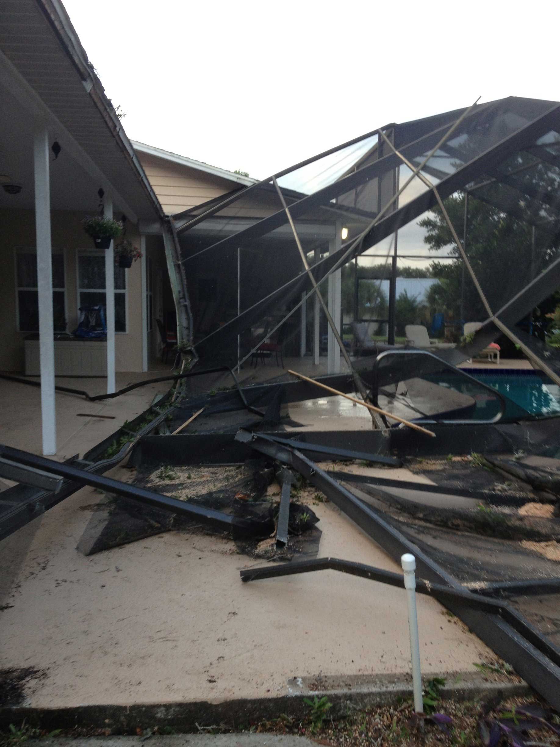 Damage Caused by The Storm at The Pool Area — Palm Bay, FL — A Advanced Tree Service