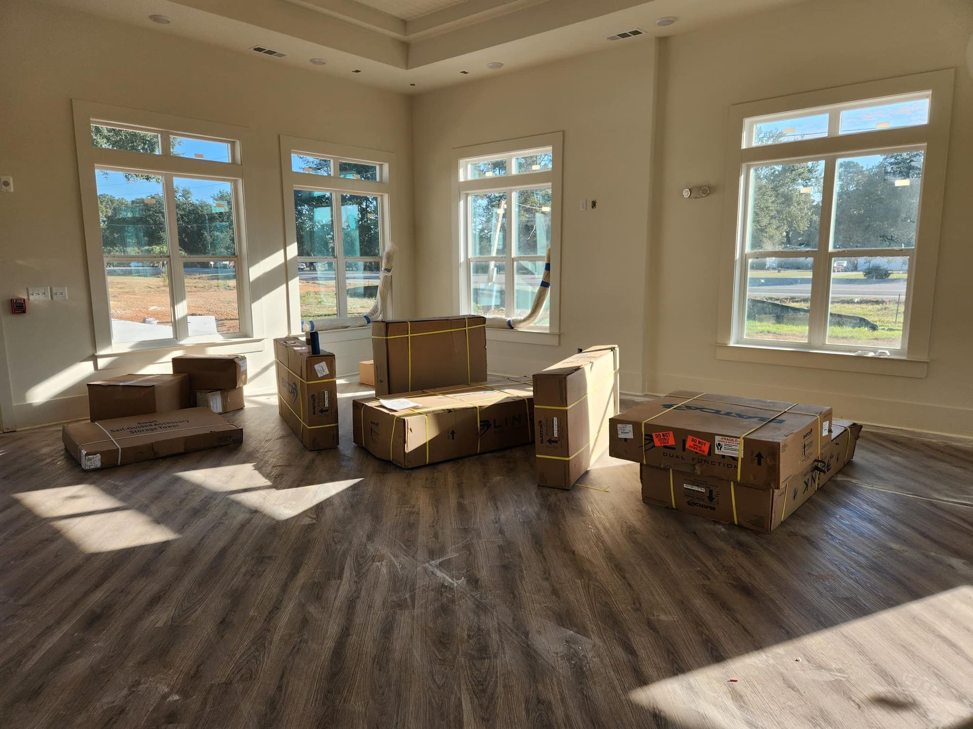 There are a lot of boxes in the room.