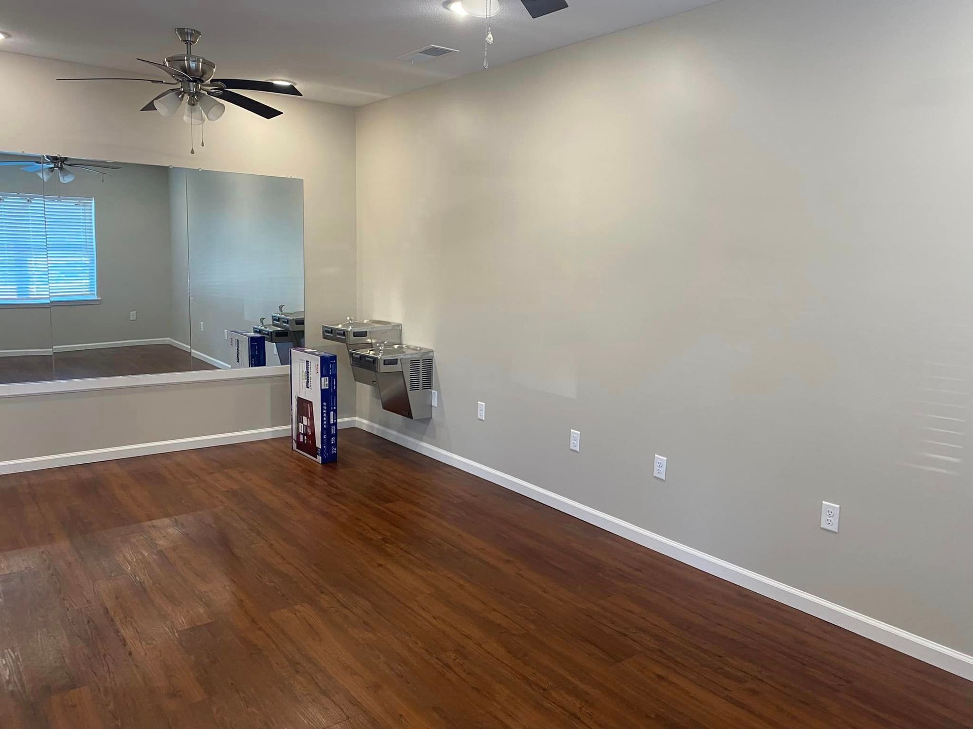 There is a large mirror in the middle of the room.