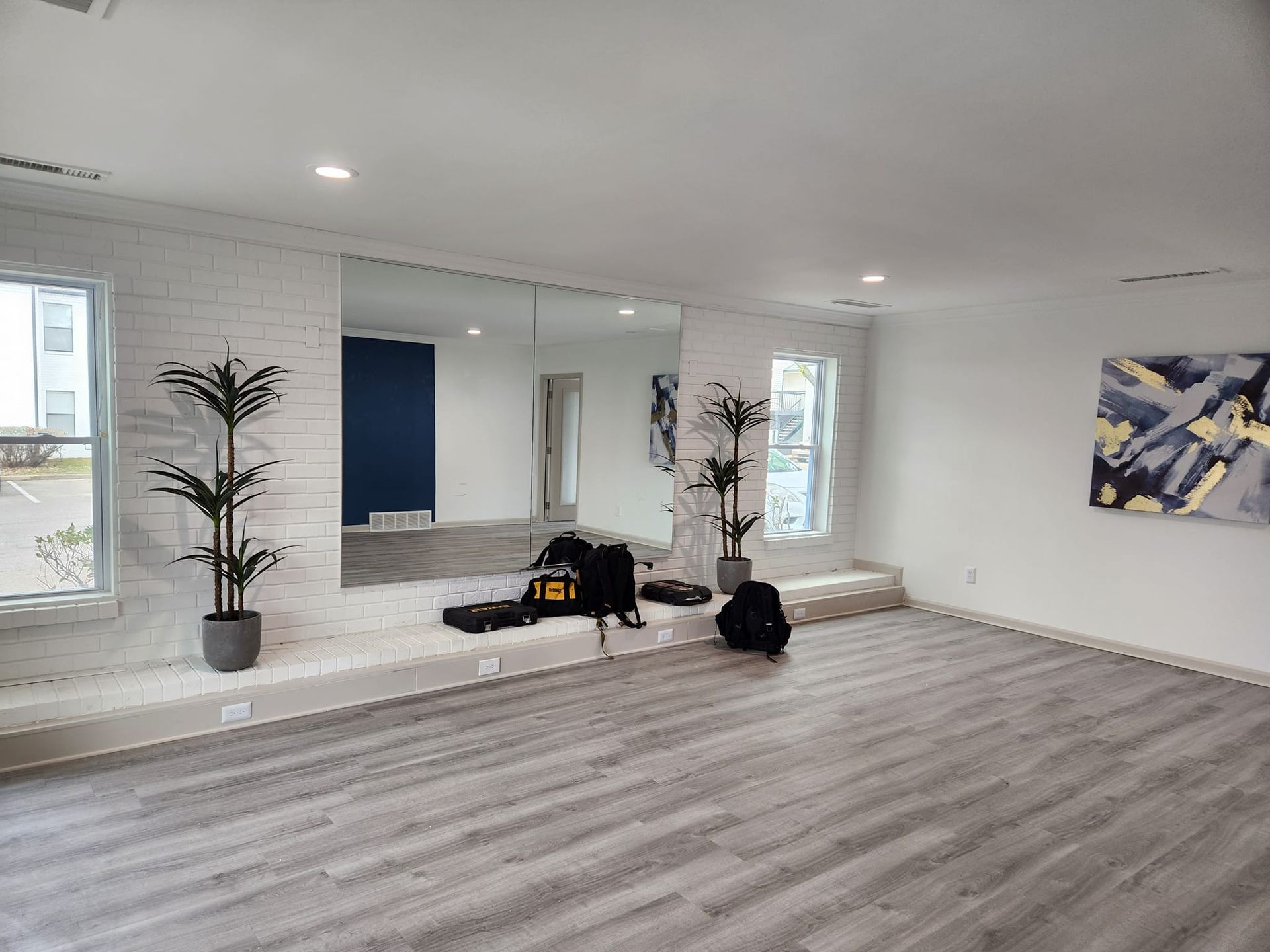 There is a large mirror in the middle of the room.